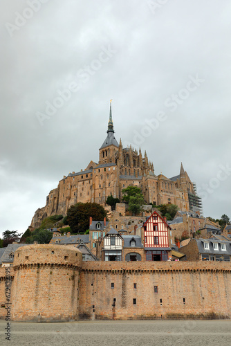 Mont Saint Michel abbeyat low tide and medieval city wall