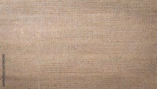 jute hessian sackcloth canvas woven texture pattern background in light beige cream brown color blank empty