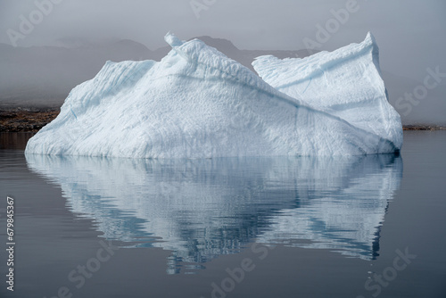 Fototapeta Naklejka Na Ścianę i Meble -  Glaciers are melting in the arctic ocean in Greenland. Large glaciers are breaking away day by day and this is a dangerous situation for the world climate system.