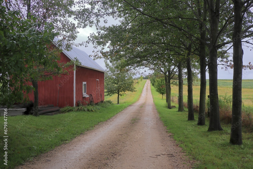 Red Shed on Tree Road in the Midwest Red Shed on Tree Road in the Midwest