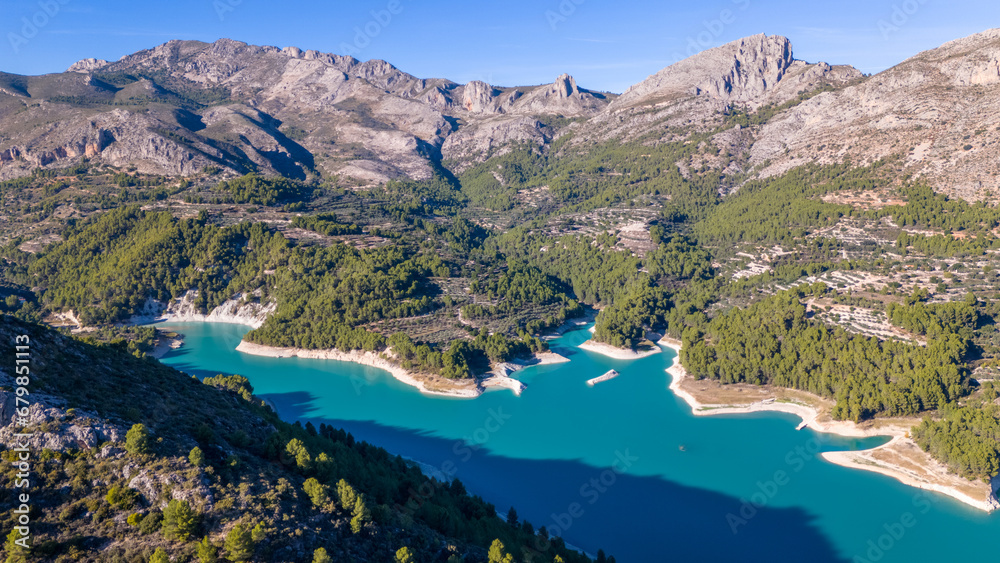 Aerial drone photo of the mountain lake named Guadalest in Alicante, Spain