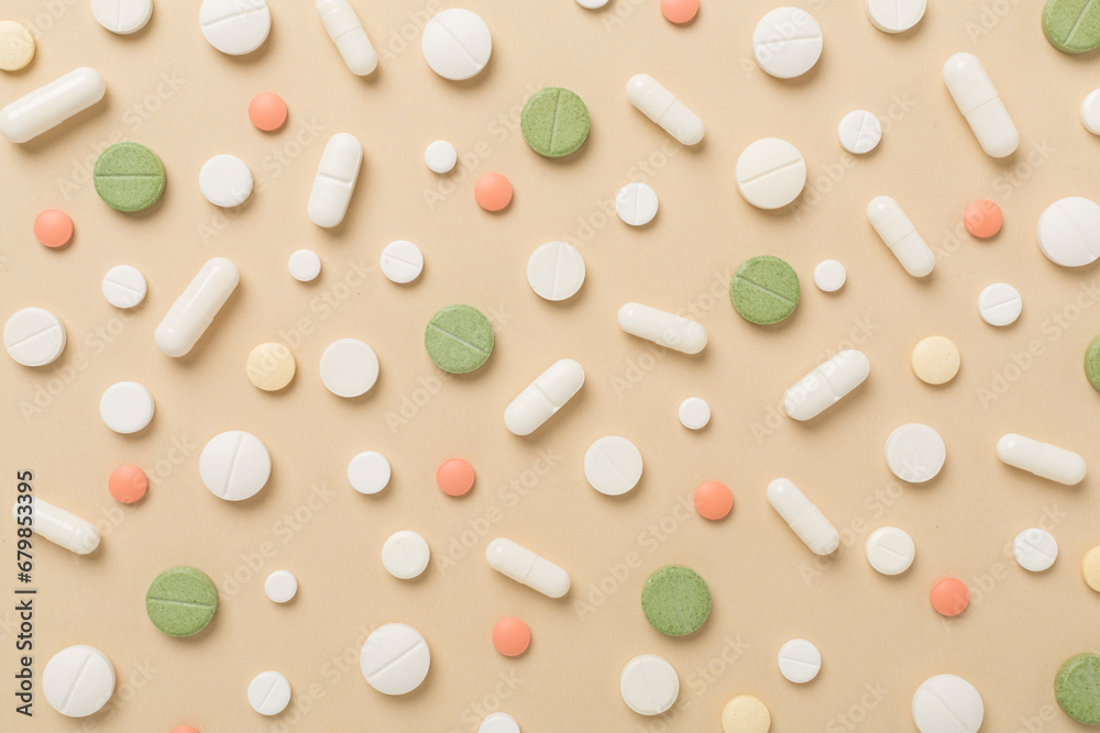Flat lay with different medical pills and capsules on color background Flat lay with different medical pills and capsules on color background