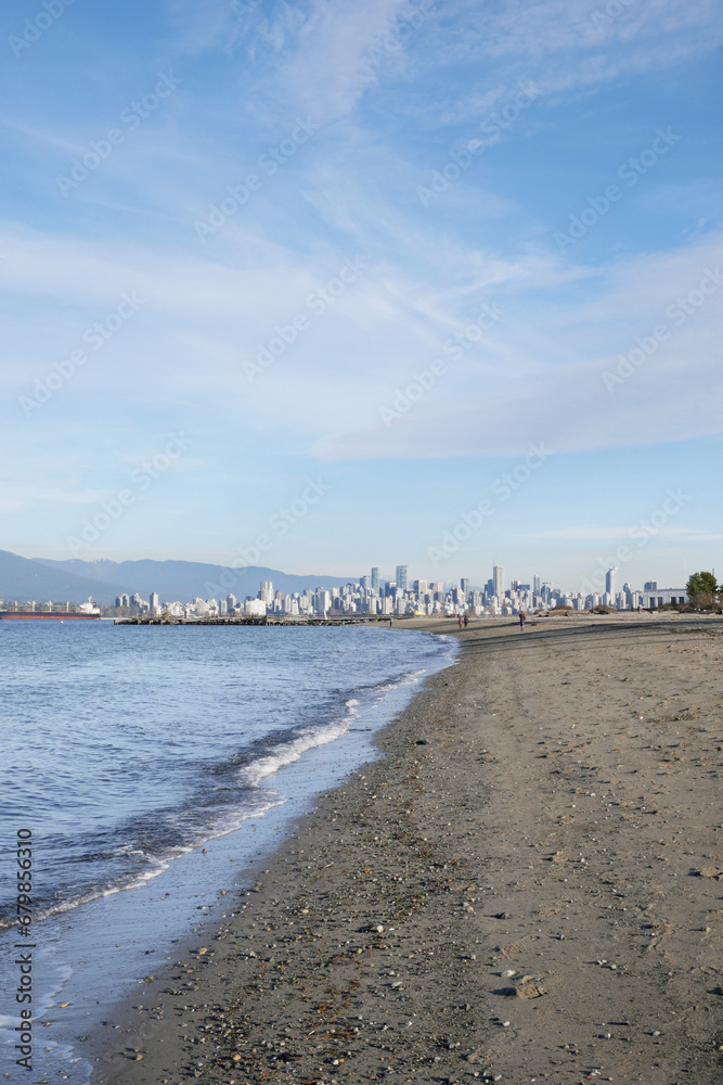 Beautiful view of the skyline of Vancouver in the distance as seen from Jericho Beach in Vancouver, British Columbia, Canada Beautiful view of the skyline of Vancouver in the distance as seen from Jericho Beach in Vancouver, British Columbia, Canada