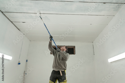 killed Professional Paints Garage in Pristine White, Transforming the Space Beautifully.