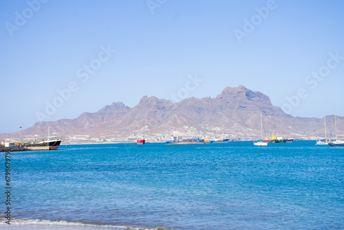 Landscape View of Laginha beach and small boat in Mindelo city in Sao Vicente Island in Cape Verde