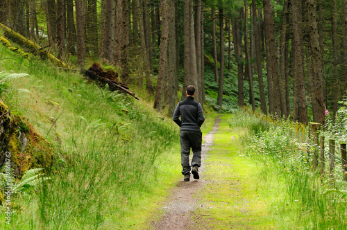 Man is walking in the nature in Wales, UK