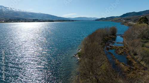 Panoramic aerial droneviews of Lake Dunstan and its mountainous shoreline in central Otago photo