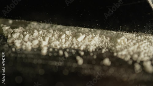 Drugs cocaine or oxy substances abuse and addiction. Hard illegal drugs. Preparing strips of white powder to blow. Drugs trafficking. Opioid crisis and opiates epidemic. Painkillers medications abuse. photo