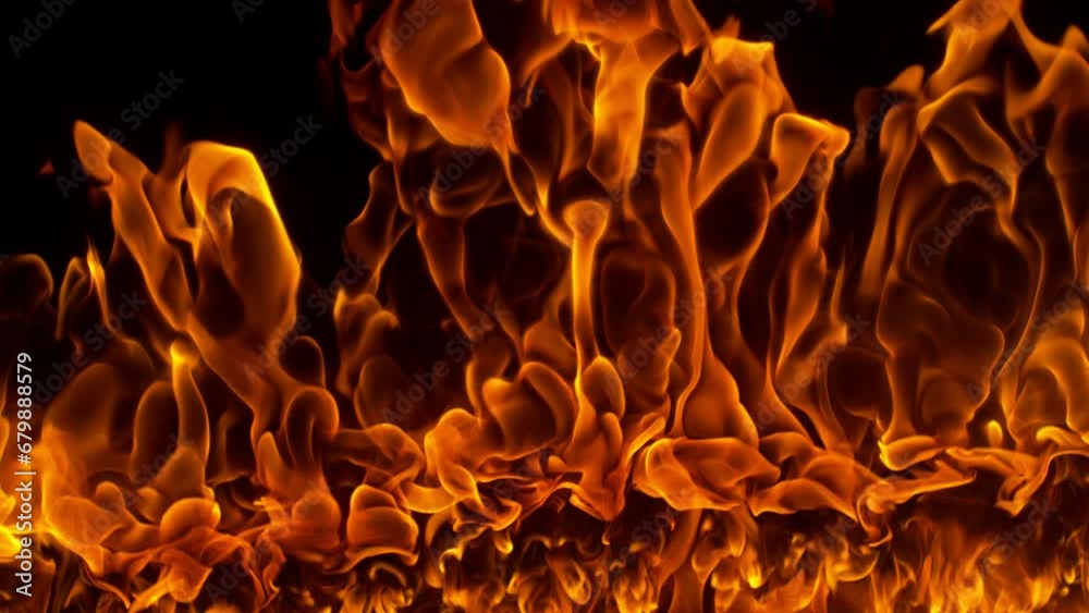 Super slow motion of fire flames isolated on black background. Filmed on high speed cinema camera at 1000 fps