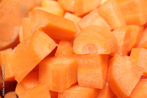 chopped carrot. peeled and chopped carrot. preparing carrots for the meal. orange natural food.