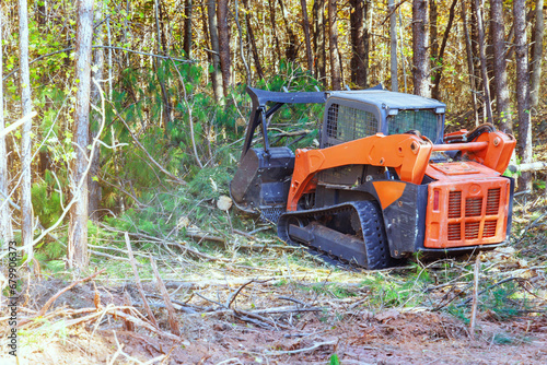 Tracked general purpose forestry mulcher was used by contractor to clean forest