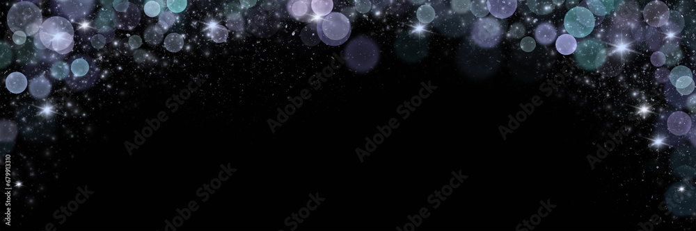dark background with sparkling effects and glowing bokeh