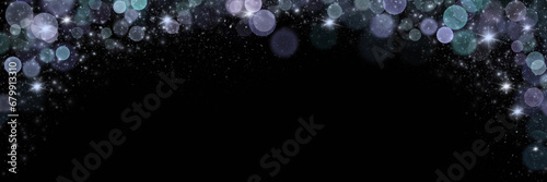 dark background with sparkling effects and glowing bokeh
