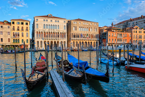 Grand Canal with boats and gondolas on sunset, Venice, Italy © Dmitry Rukhlenko