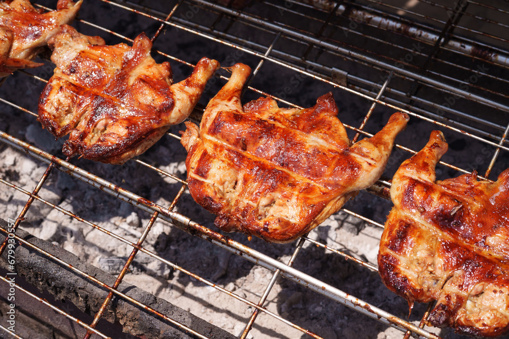 Grilled chicken on the grill