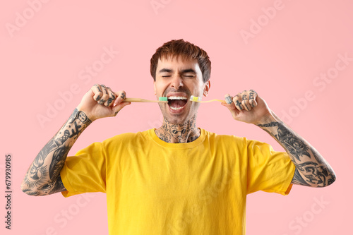 Young tattooed man with too...