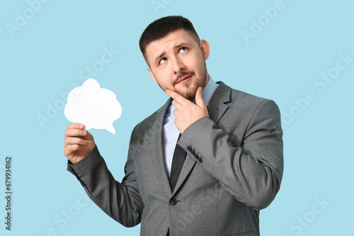 Young thoughtful businessma...