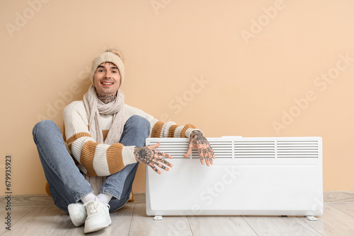 Young man in winter clothes...