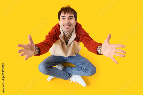 Young man opening arms for ...