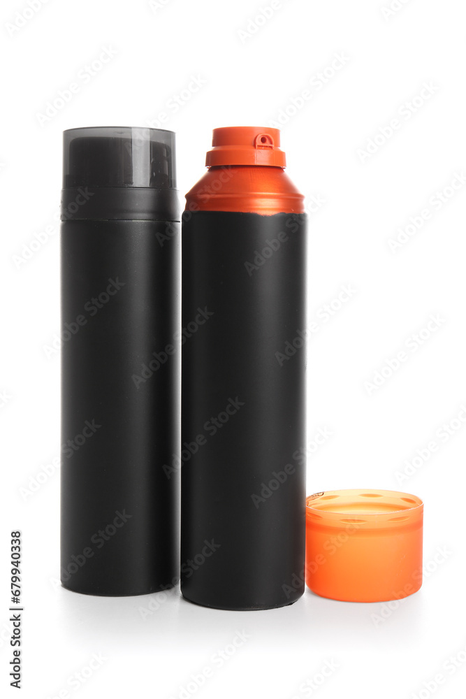 Bottles of shaving foam isolated on white background Bottles of shaving foam isolated on white background