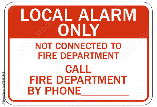 Fire alarm sign and labels local alarm only. Not connected to fire department call fire department by phone