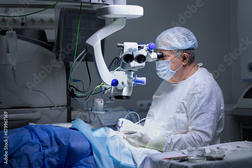 microsurgery of the eye. the surgeon is performing the operation with the help of special equipment