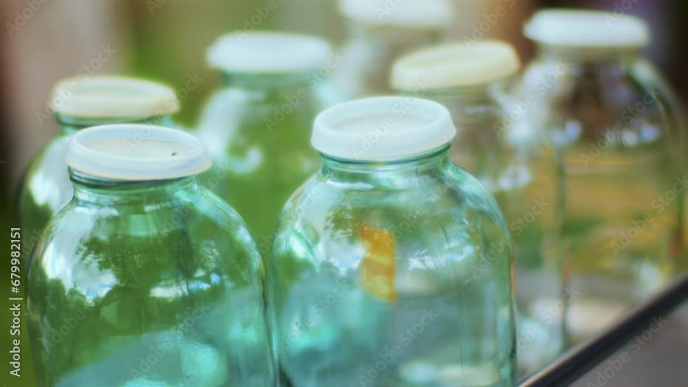 Close-up shot of empty juice glass jars mostly used for fruit juices in summer Close-up shot of empty juice glass jars mostly used for fruit juices in summer