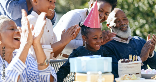 Child  grandparents or black family in backyard for a happy birthday  celebration or growth together. Smile  clapping or excited African people with cake  love or kids in a fun party  nature or park