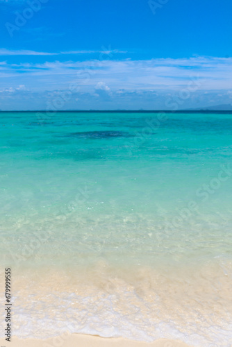 Emerald color sea with wave in Thailand