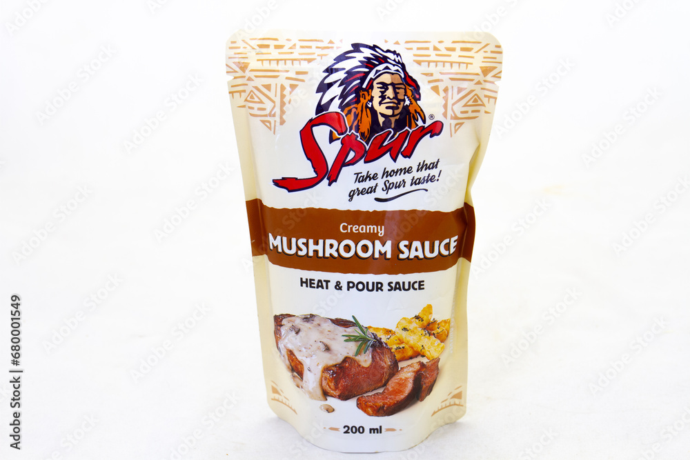 Johannesburg, South Africa heat and pour creamy mushroom sauce from