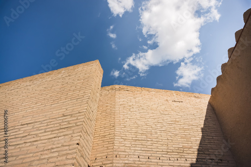 Ancient defensive walls of the city of Khiva in the Khorezm region, the brick walls have stood for many centuries photo