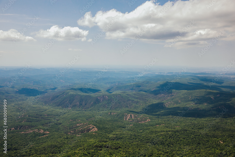 Fototapeta premium Beautiful landscape on top of mountain green forest and sky cliffs