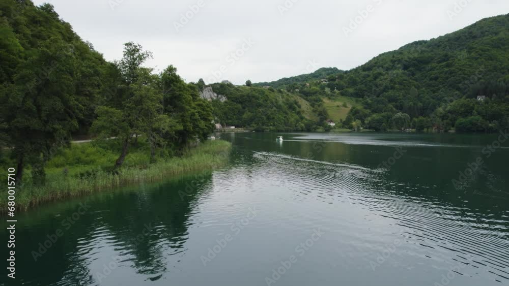 Tranquil Veliko Plivsko Lake Scene in Jajce, Bosnia. Aerial FlyOver Tranquil Veliko Plivsko Lake Scene in Jajce, Bosnia. Aerial FlyOver