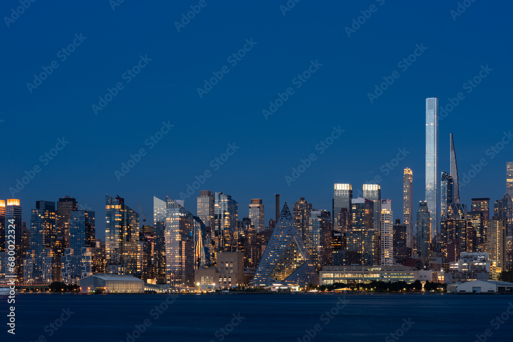 New York west side and panoramic view on office buildings at night