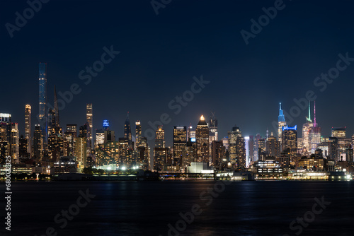 New York west side and panoramic view on office buildings at night