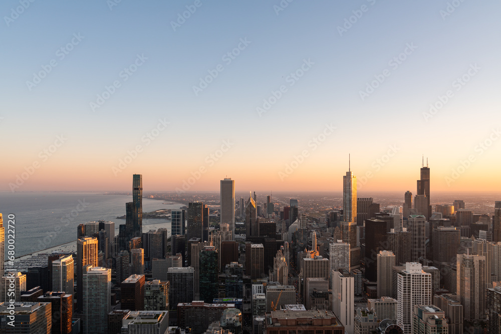 Chicago city skyline aerial view, lake Michigan and evening sunset
