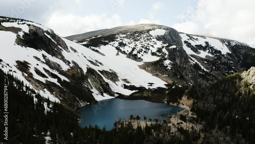 Wallpaper Mural Wide aerial view of Saint Mary's Glacier looming over a icy cold lake in Colorado. Torontodigital.ca