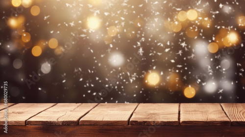 empty table on the Christmas golden bokeh and falling snow background