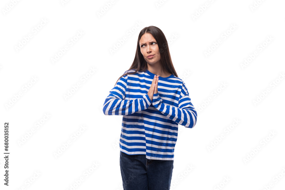 pretty slender brunette with straight hair is dressed in blue striped sailor clothes pretty slender brunette with straight hair is dressed in blue striped sailor clothes