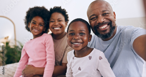 Portrait, selfie and black family parents, happy kids or people bonding, love and care in memory photo. Home face, photography and African children, father and mother support, relax or smile together © Charlize D/peopleimages.com