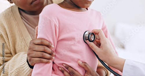 Doctor, child and chest with stethoscope in closeup for examination, medical appointment or checkup in home. Paediatrician, cardiology and listen to breathing, lungs or heart in problem for illness