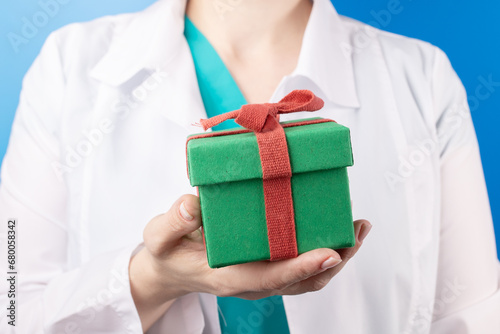 doctor with gift box, Medicine and healthcare, winter sale and discount © yta