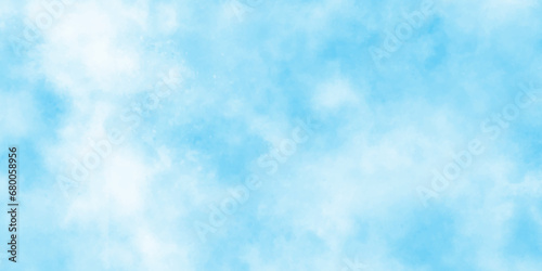 blue watercolor painted blurry and defocused Cloudy Blue Sky Background,Classic hand painted Blue watercolor background for design.Classic hand painted Blue watercolor background for design.