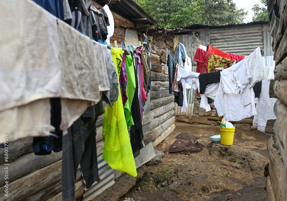 Drying laundry in the narrow streets of Kibera slum in Nairobi, Kenya