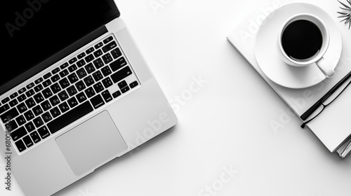 Minimal work space - Creative flat lay of workspace desk. Top view office desk with laptop, notebooks and coffee cup on white background. Panoramic banner background with copy space