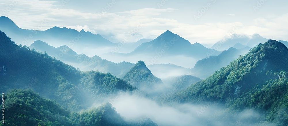 Morning mist creates a stunning nature scene in Kerala known as God s Own Country This image evokes fresh relaxation and invites tourism and travel Copy space image Place for adding text or des - obrazy, fototapety, plakaty 