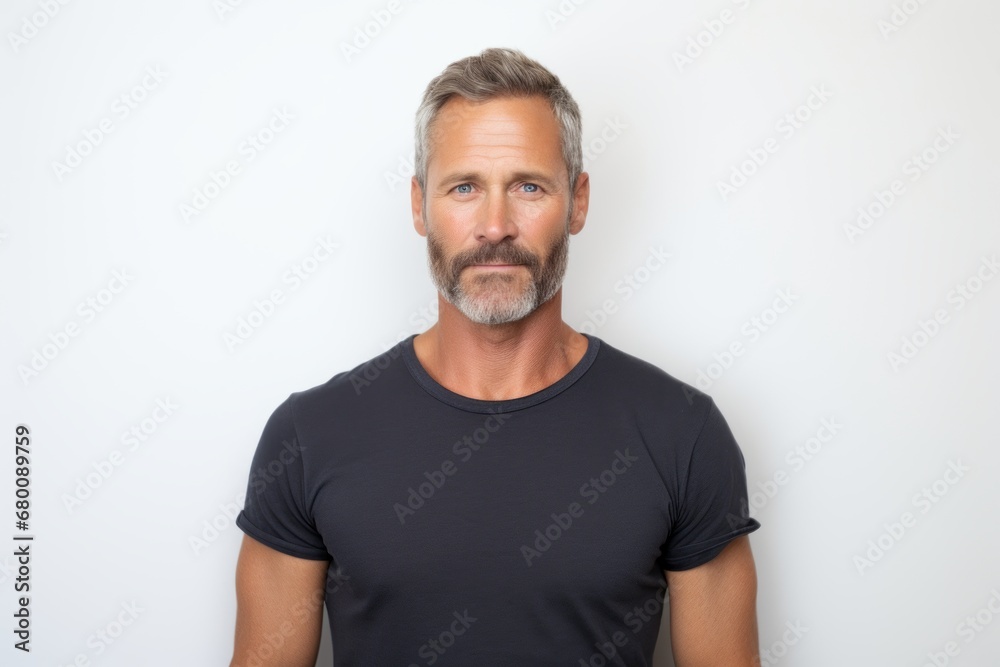 Portrait of a content man in his 40s donning a trendy cropped top against a white background. AI Generation Portrait of a content man in his 40s donning a trendy cropped top against a white background. AI Generation