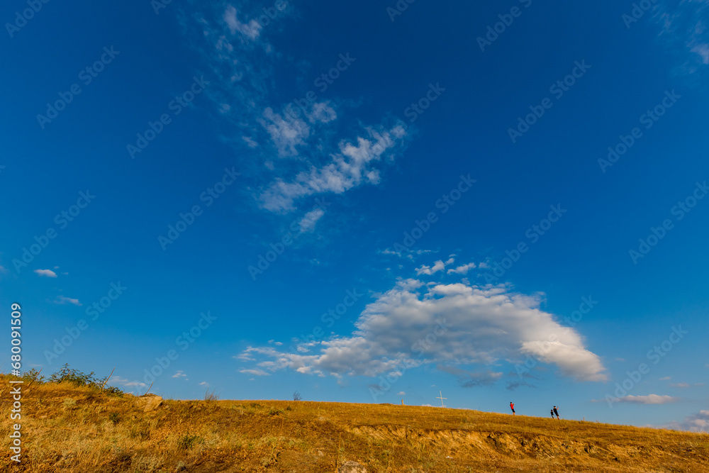 People at abandoned hill cemetery near Zhrebchevo dam in Central Bulgaria