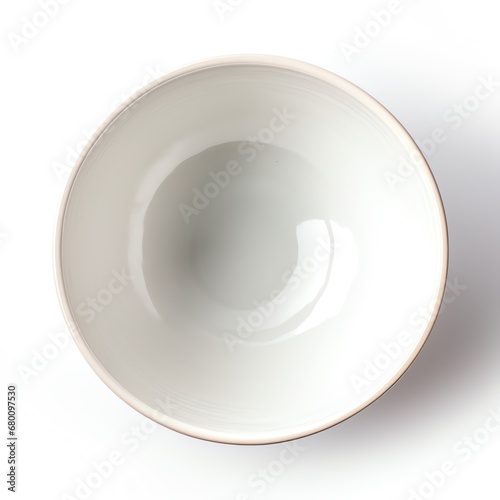 a white bowl with a brown rim