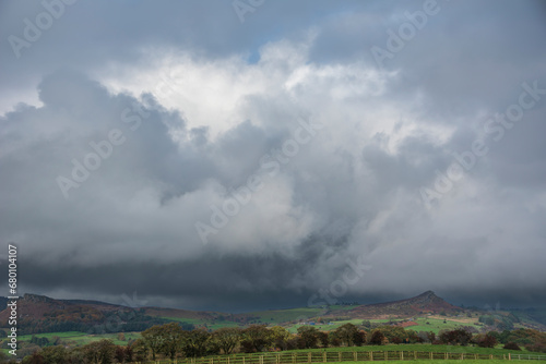 Beautiful wide vista landscape image of English countryside in Peak District National Park late afternoon early Autumn photo